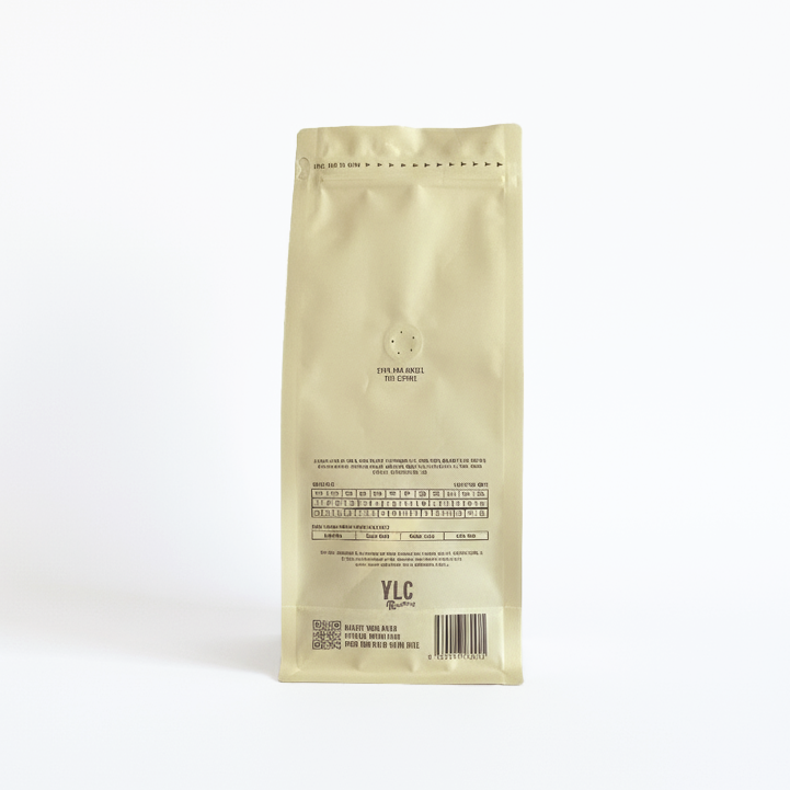 yellow coffee bag with text on a white background